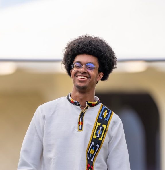 Bis wearing cultural Ethiopian clothing